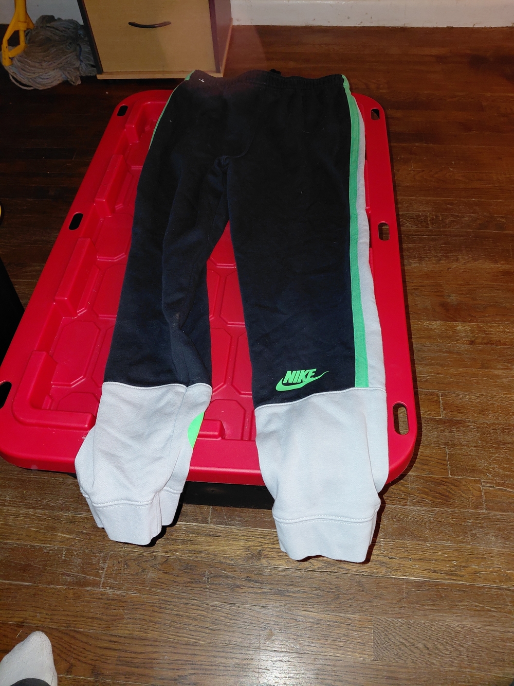 Nike Kids Black Sweatpants with White Cuffs and Green Stripe